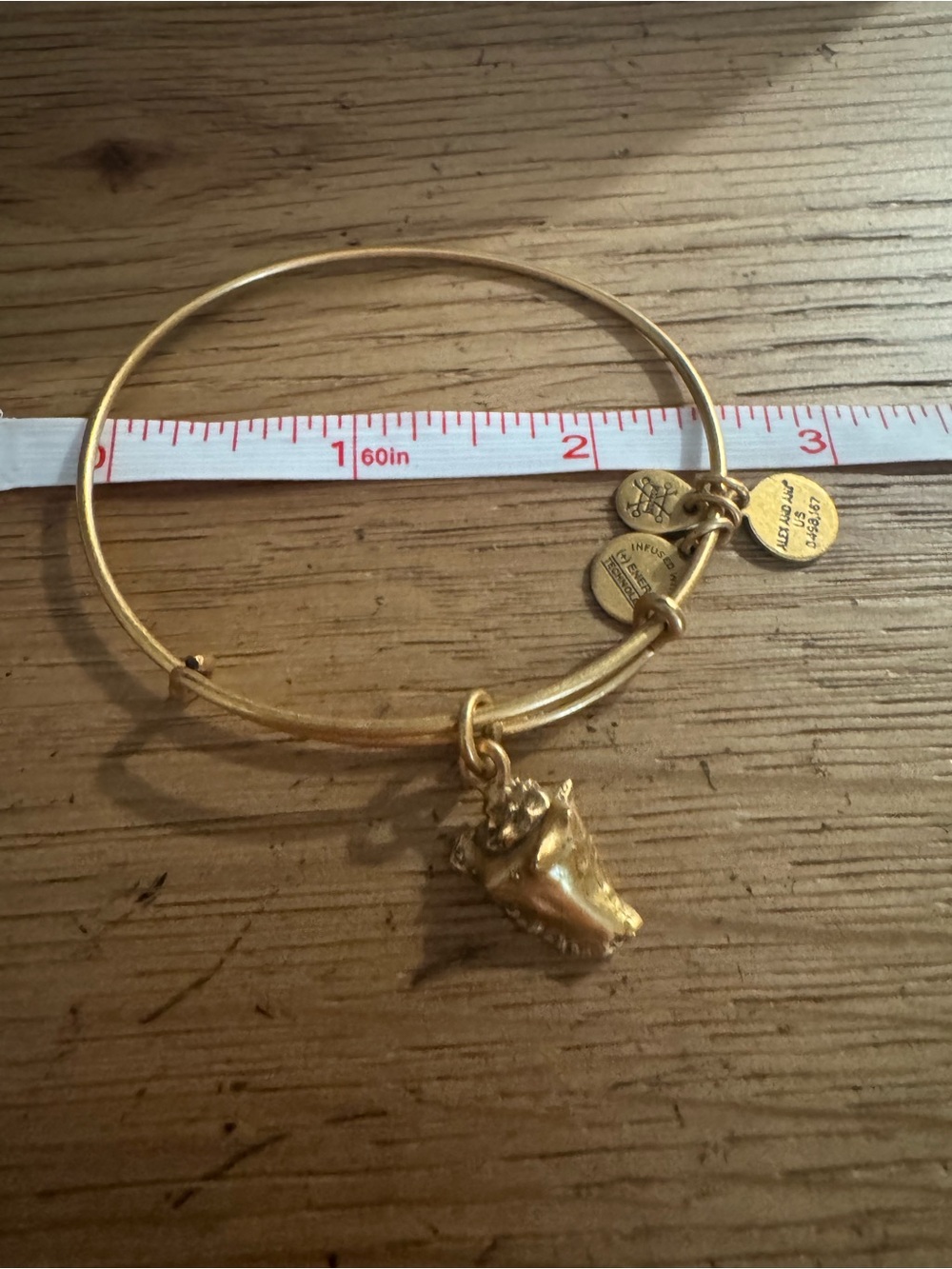 Gold Tone Charm Bangle Bracelet with Conch Shell Charm - Alex and Ani